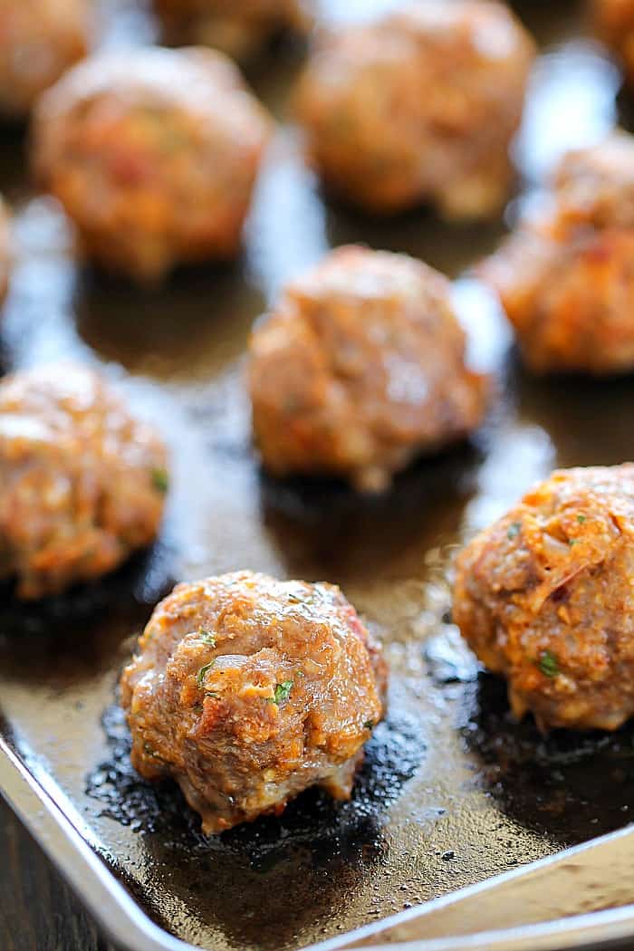 Bacon Meatballs cooked and ready to devour on a sheet pan! Eat them straight from the pan or put them with your favorite spaghetti!