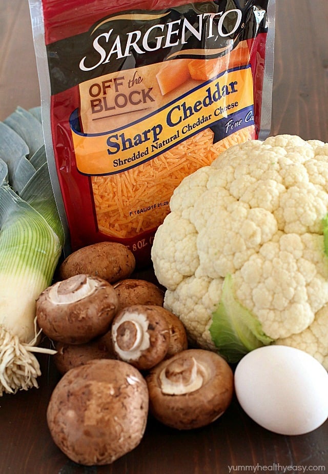 Cheesy Cauliflower Casserole makes the most delicious side dish or meatless main dish! Full of flavor with cauliflower, sautéed mushrooms & leeks, and an easy cheesy sauce that won't pack on the calories. This is incredible! AD