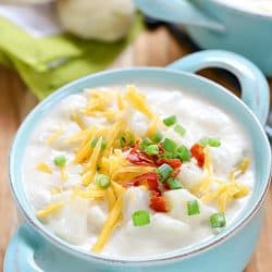 This Easy Cheesy Potato Soup is made in one pot and is done in under 30 minutes! Super easy comfort food that everyone will love!