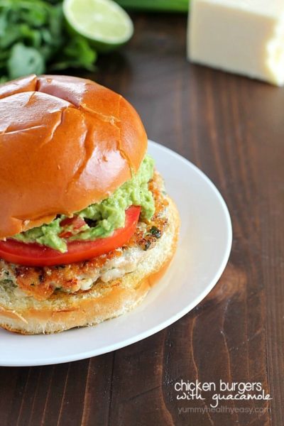 The juiciest, most delicious, guacamole chicken burgers! Super simple to make - serve on buns with a layer of guacamole on the top. Amazing!