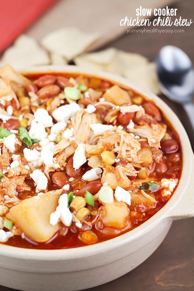 Yummy crock pot chicken chili stew with pinto beans, potatoes, corn, spices and topped with feta cheese. Easy prep and so delicious!