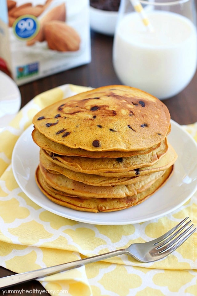 Flavorful pancakes full of pumpkin and chocolate chips that are also whole wheat and dairy-free! My family ate all of these and I had to make a second batch!