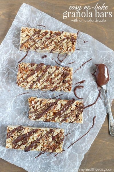 Top view of Easy No-Bake Granola Bars with oats, almonds and coconut with a delicious chocolate & Nutella drizzle on top.