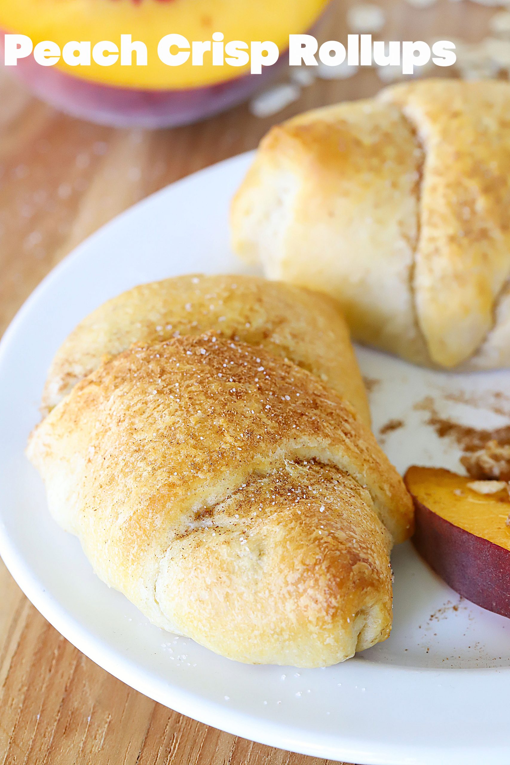 If you love Peach Crisp but don't want to make a whole pan of it, you need to try these Easy Peach Crisp Rollups! Minimal ingredients, easy to make and incredibly delicious! They're the perfect portion controlled dessert! #dessert #peaches #crisp #easydessert #fallfood #yummyhealthyeasy via @jennikolaus