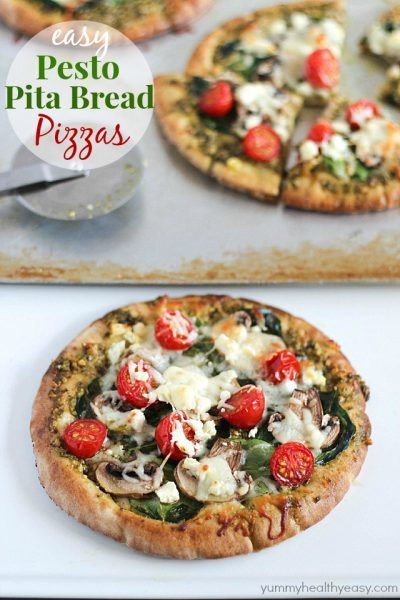 These Easy Pesto Pita Bread Pizzas use pita bread as the crusts and are spread with pesto and topped with veggies. Delicious and healthy lunch, dinner or snack!
