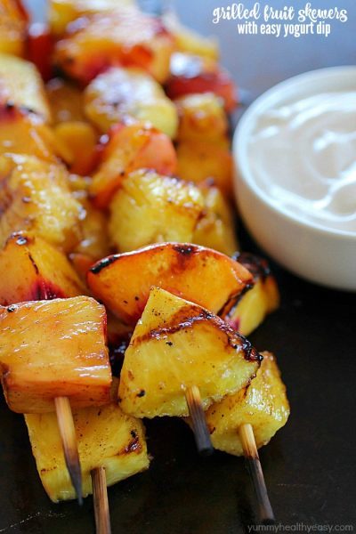 Fruit Skewers are grilled with a sweet cinnamon glaze and dipped in a delicious easy yogurt dip! You will go crazy for these grilled fruit skewers! AD