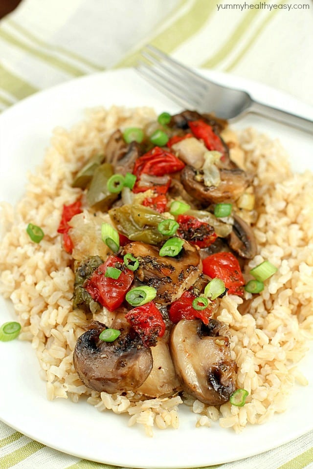 Baked "Smothered Chicken" may sound weird, but this is an incredibly easy and delicious one-pan, baked chicken dinner recipe that my family loves! It's healthy and high in protein and is low-carb & gluten-free without the side of rice. Super easy and no pre-cooking of the meat, just throw it all in the pan and bake! It comes out juicy and flavorful!