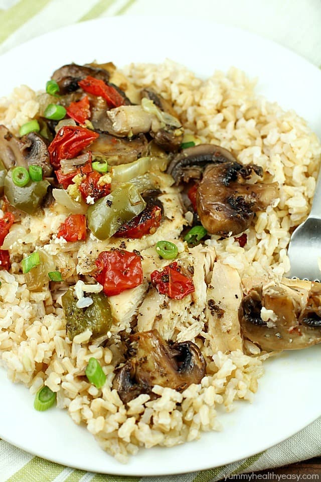 Baked "Smothered Chicken" may sound weird, but this is an incredibly easy and delicious one-pan, baked chicken dinner recipe that my family loves! It's healthy and high in protein and is low-carb & gluten-free without the side of rice. Super easy and no pre-cooking of the meat, just throw it all in the pan and bake! It comes out juicy and flavorful!