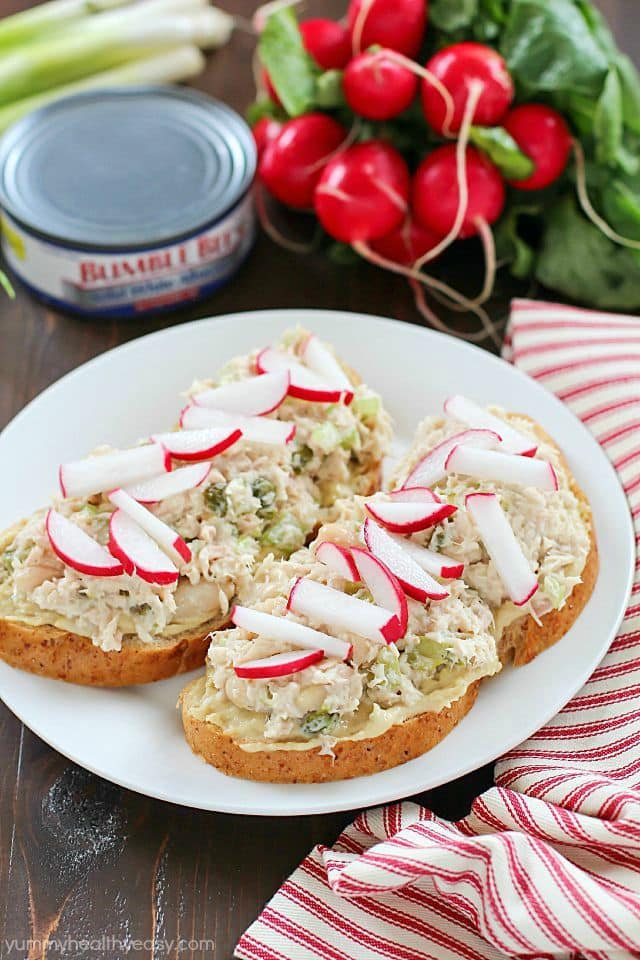 Take that boring tuna sandwich to the next level and make this Mediterranean Hummus Tuna Sandwich Recipe! It's easy, healthy and super flavorful! Definitely a lunchtime winner!
