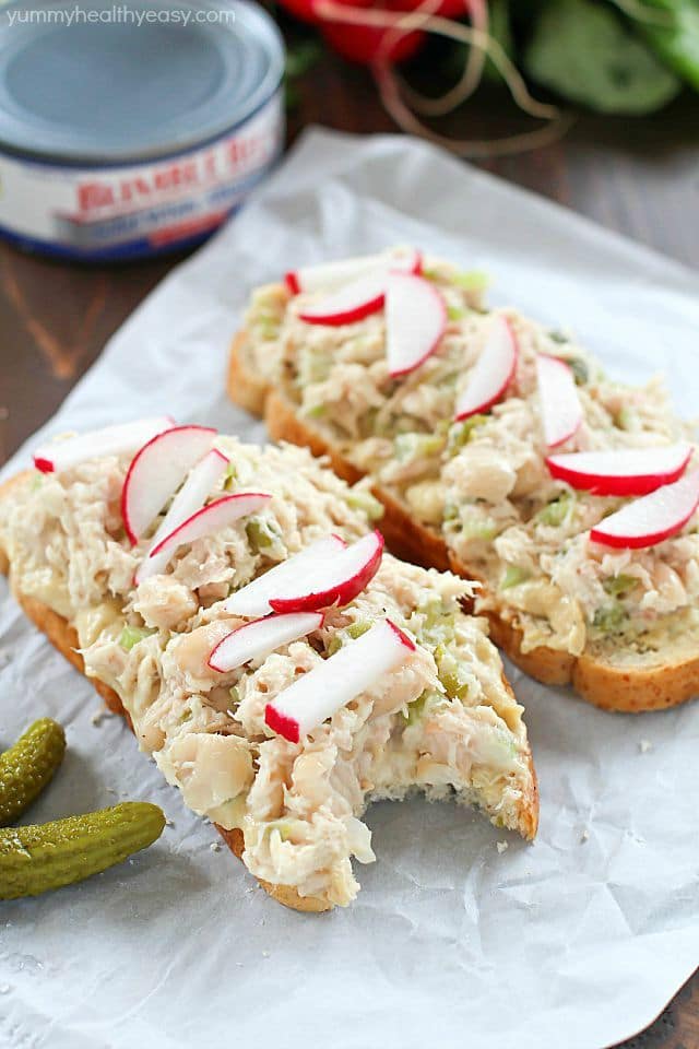 Take that boring tuna sandwich to the next level and make this Mediterranean Hummus Tuna Sandwich Recipe! It's easy, healthy and super flavorful! Definitely a lunchtime winner!