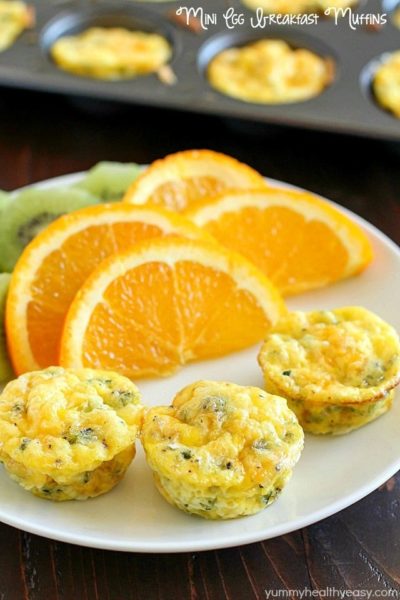 Egg Breakfast Muffins that are full of kale, potato, egg and topped with cheese. Mini, kid-friendly, easy to make, and quick to reheat for a breakfast on the go! AD