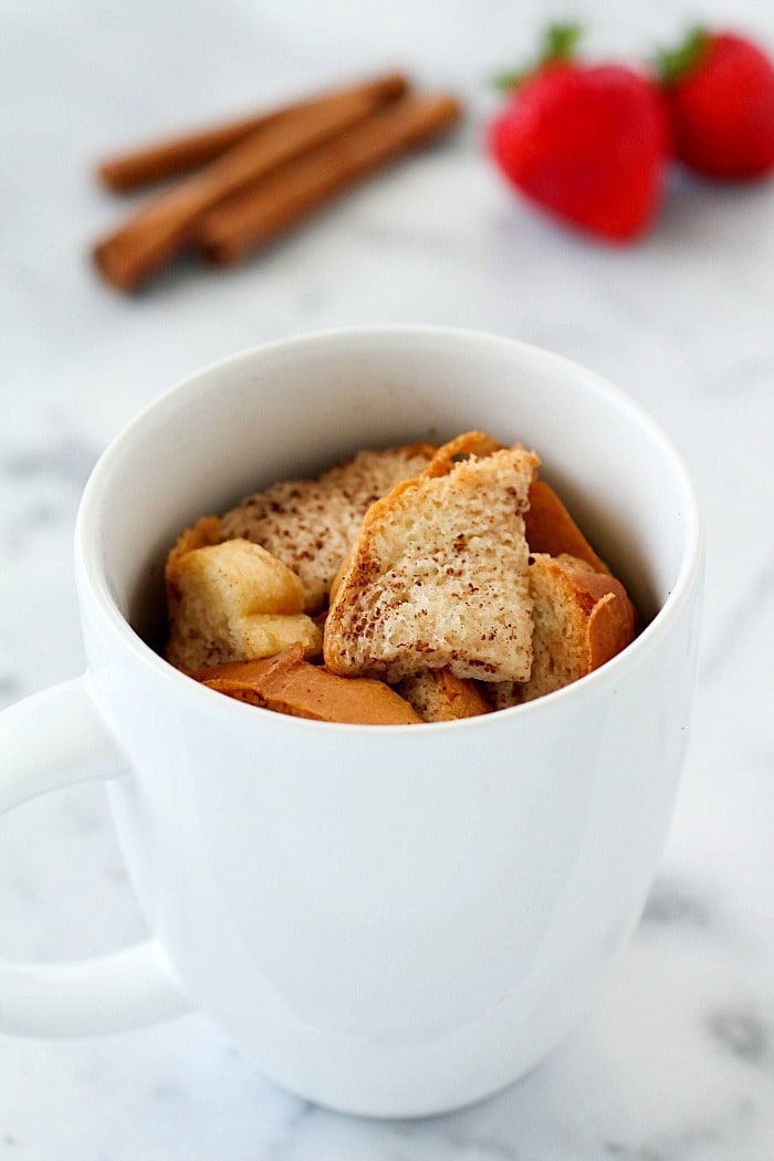 Quick & Easy Mug French Toast has all that you love about french toast but conveniently cooked right in a mug for a single serving! French Toast in a mug is such an easy breakfast for on-the-go plus it uses egg whites to save some calories. Only 170 calories and 12 grams of protein for a yummy and satisfying breakfast! AD