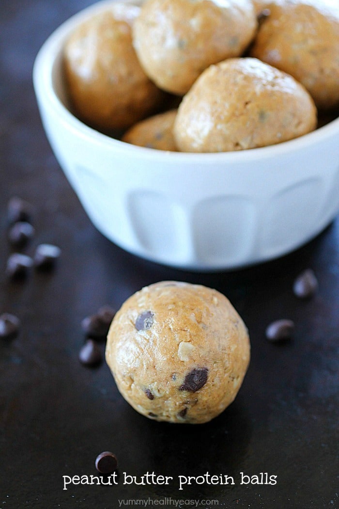 Protein balls filled with peanut butter, protein powder and oats make the most delicious on-the-go snack! Whenever you need a little protein boost to get you to the next meal, these little bites have you covered! Only 5 simple ingredients, too!