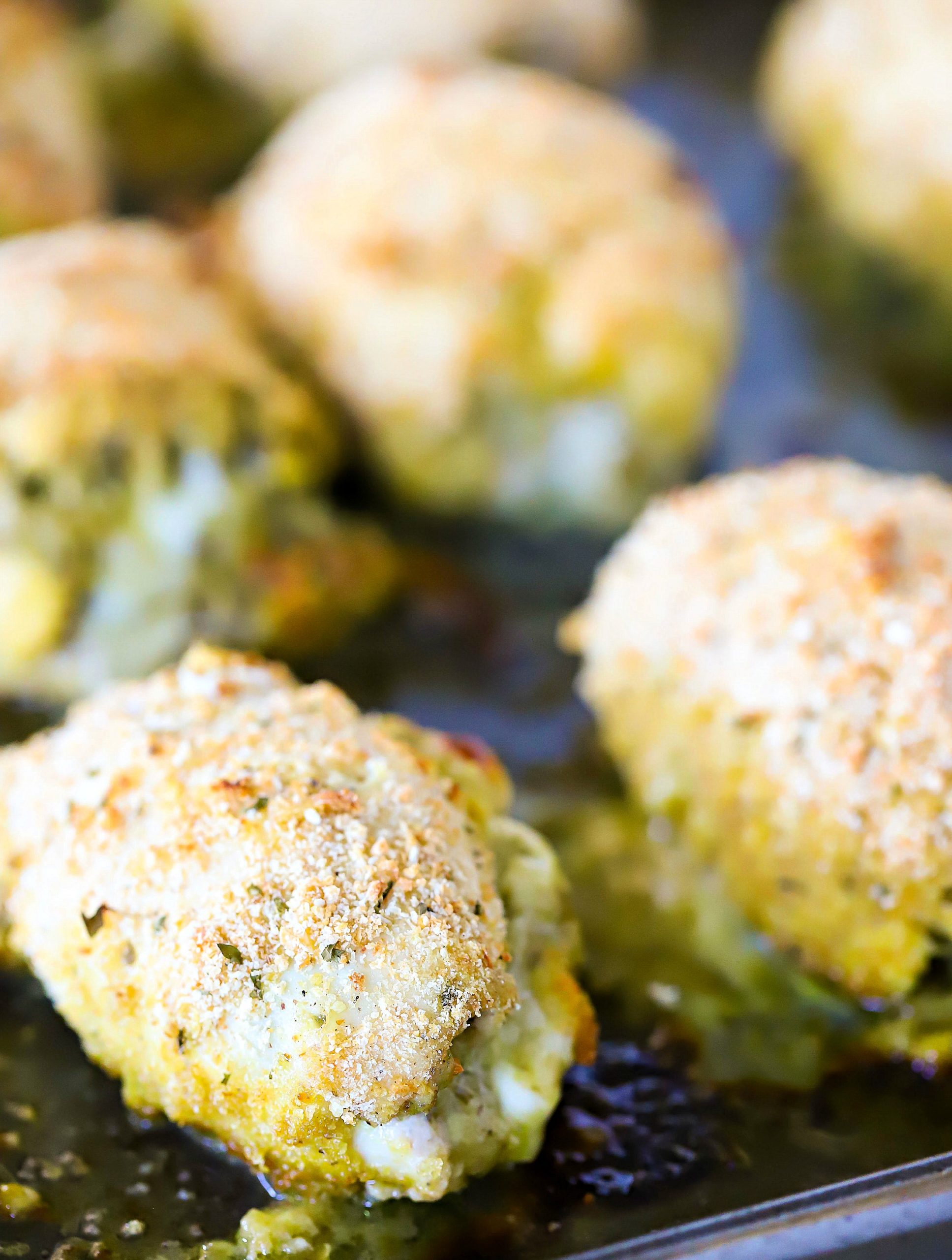 Pesto Chicken on a cookie sheet