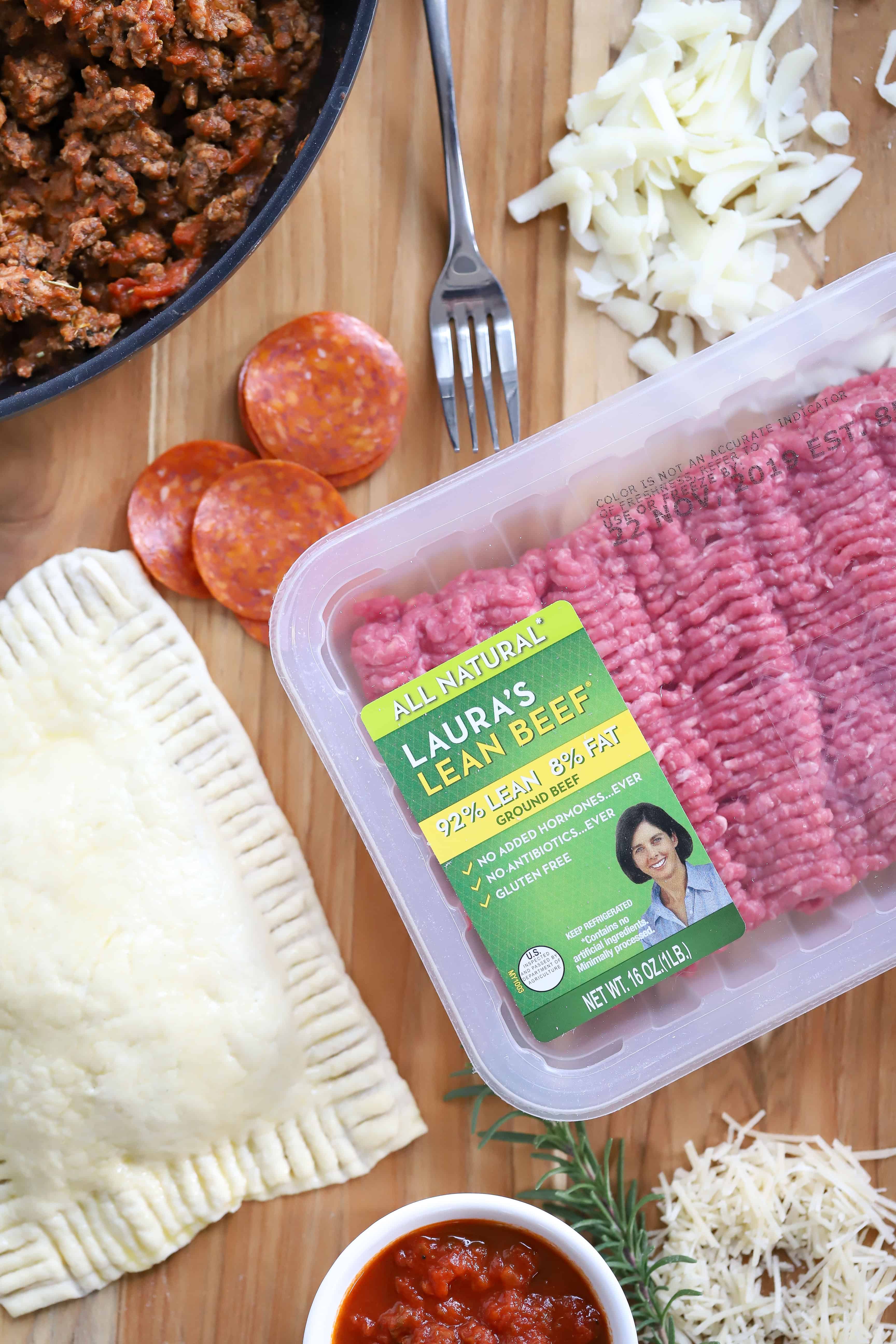 Overhead shot of Laura's Ground Beef, pizza pocket, pizza sauce, cheese and pepperoni. #ad