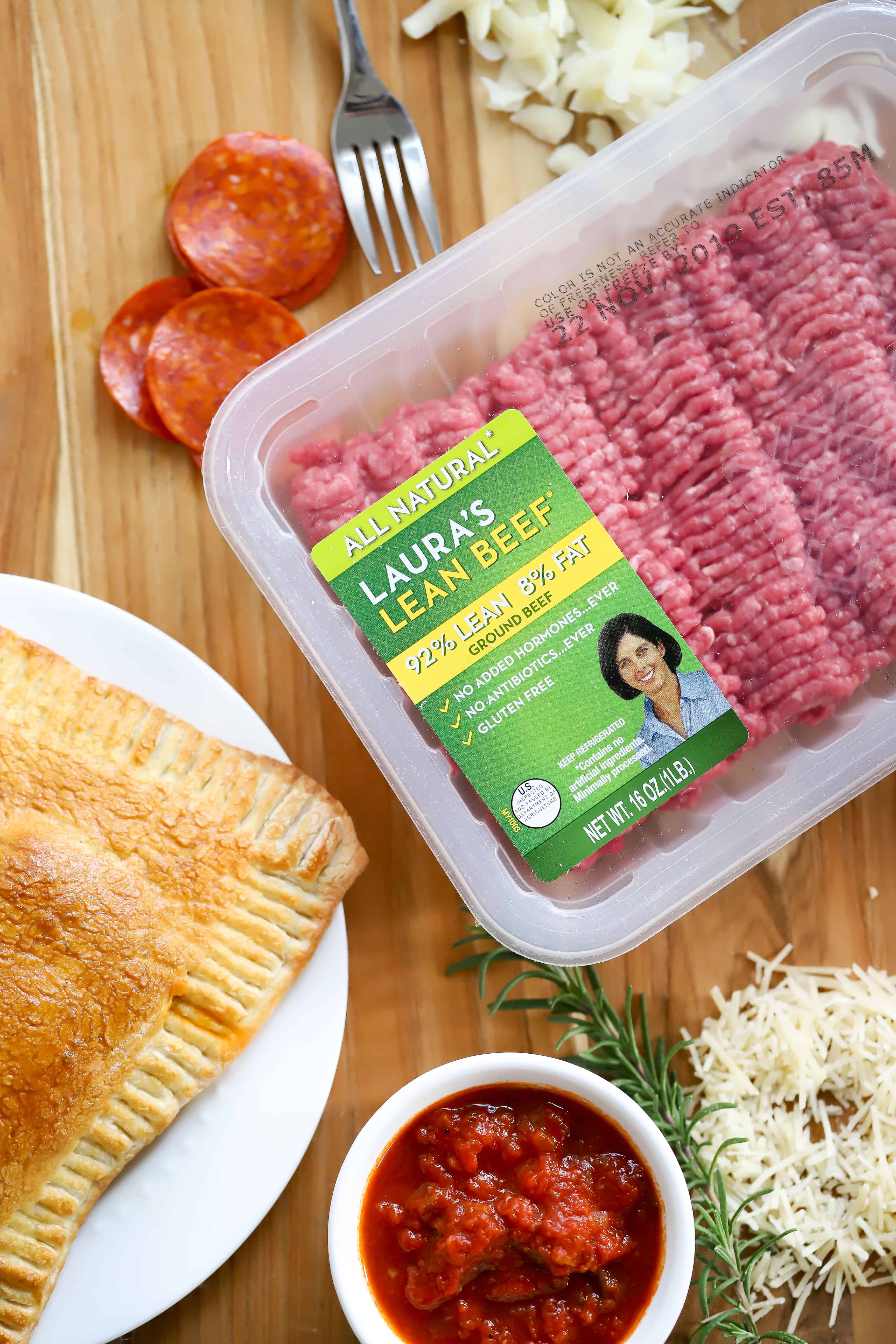 Overhead shot of Laura's Ground Beef, pizza pocket, pizza sauce, cheese and pepperoni. #ad