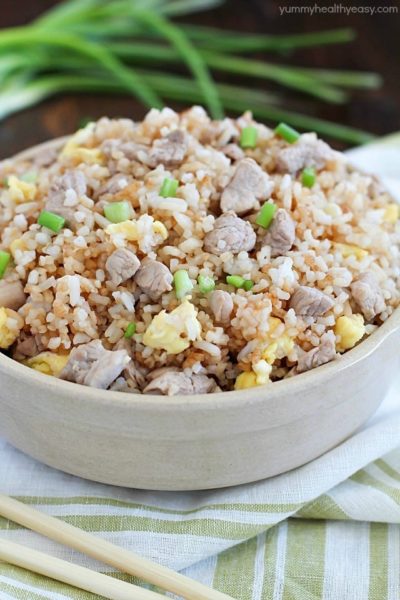 Crazy delicious kid-friendly, family-favorite Pork Fried Rice that's easy, only has seven simple ingredients, takes 20 minutes or less and will WOW any and everyone! Definitely PIN this for later!