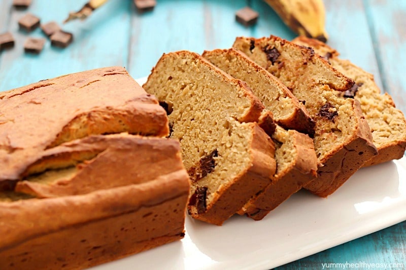 Healthy Banana Bread recipe made with a secret ingredient ;) and all in the food processor! It's moist, decadent and perfect for using up those ripe bananas laying on your counter.