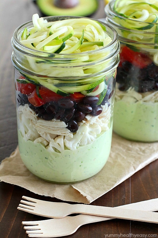 Avocado dressing (southwest style!) is nestled on the bottom of this delicious mason jar salad with zucchini noodles on the top and chicken, veggies and black beans tucked in the middle. A delicious and healthy low-carb, low-sugar lunch prepared ahead of time and eaten on-the-go! Plus a HUGE Blendtec Giveaway you won't want to miss!!