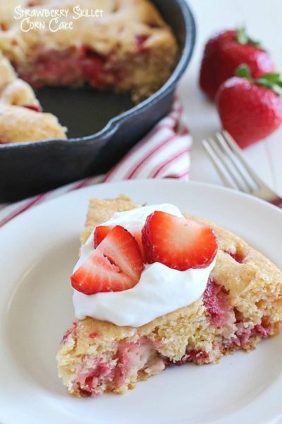 This Strawberry Skillet Corn Cake is full of strawberry goodness! It's super easy to make, with only a few ingredients and absolutely perfect to serve for brunch, dessert or a fun snack!