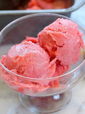 Get ready for the best summertime dessert! This Strawberry Sorbet Recipe is easy to make, healthier than most desserts and absolutely delicious!