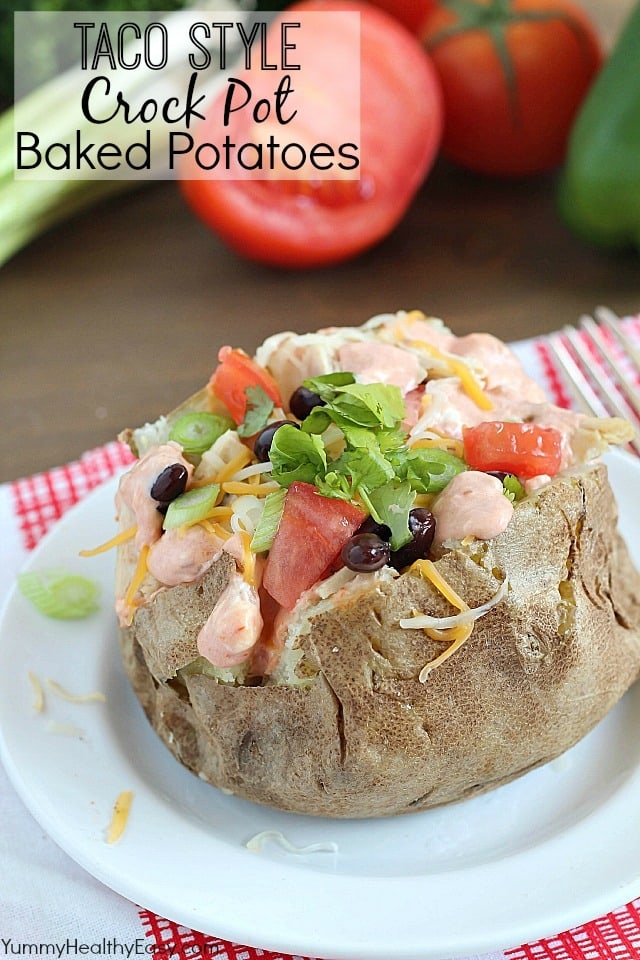 Easy Crock Pot Baked Potatoes served with a creamy salsa and topped with all your favorite taco toppings! Easy Crock Pot Baked Potatoes served with a creamy salsa and topped with all your favorite taco toppings!