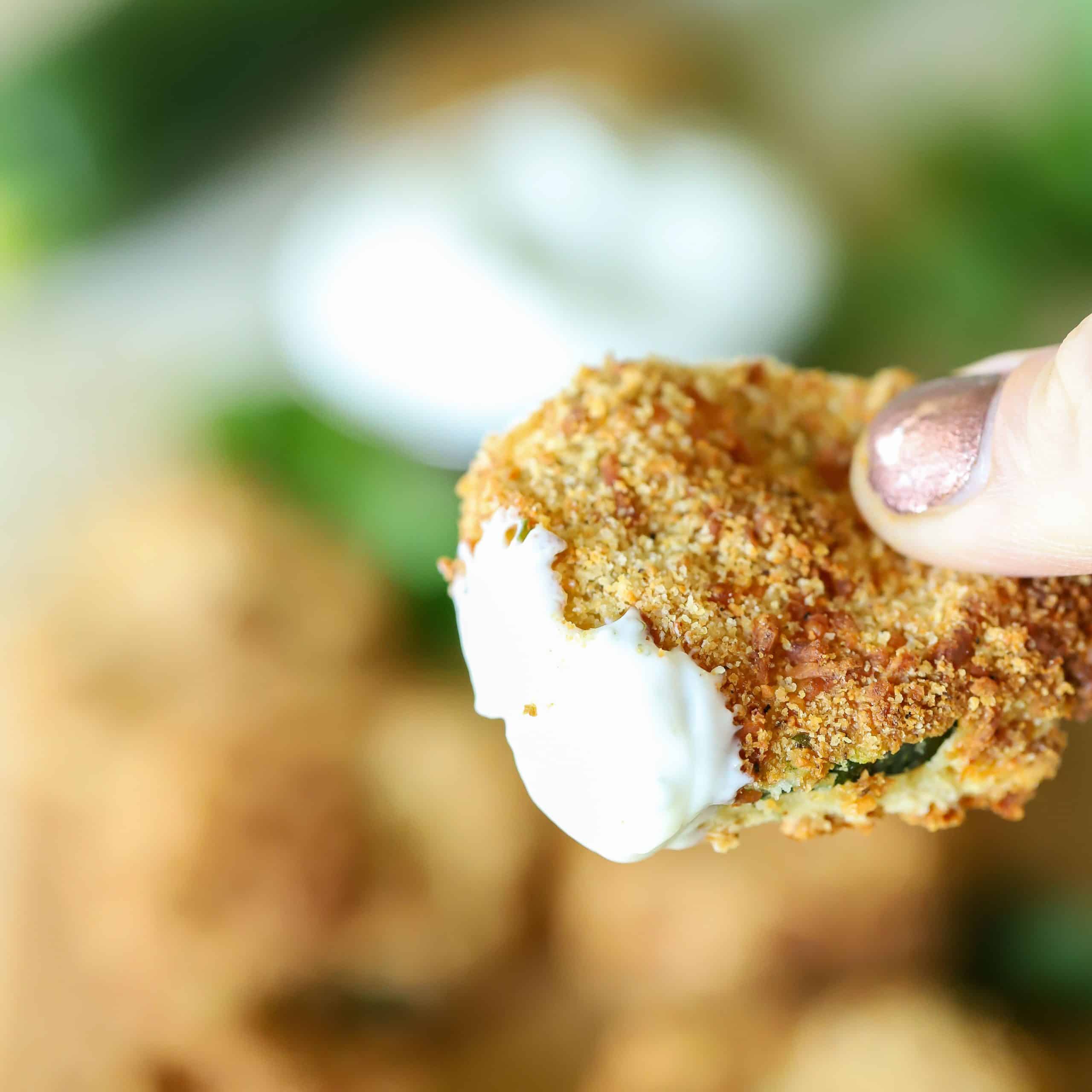 Breaded Zucchini dipped in a yummy sauce.